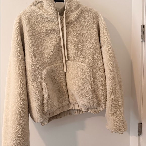 Alo Yoga Duality Sherpa Reversible Jacket in Cream and White - Picture 6 of 9